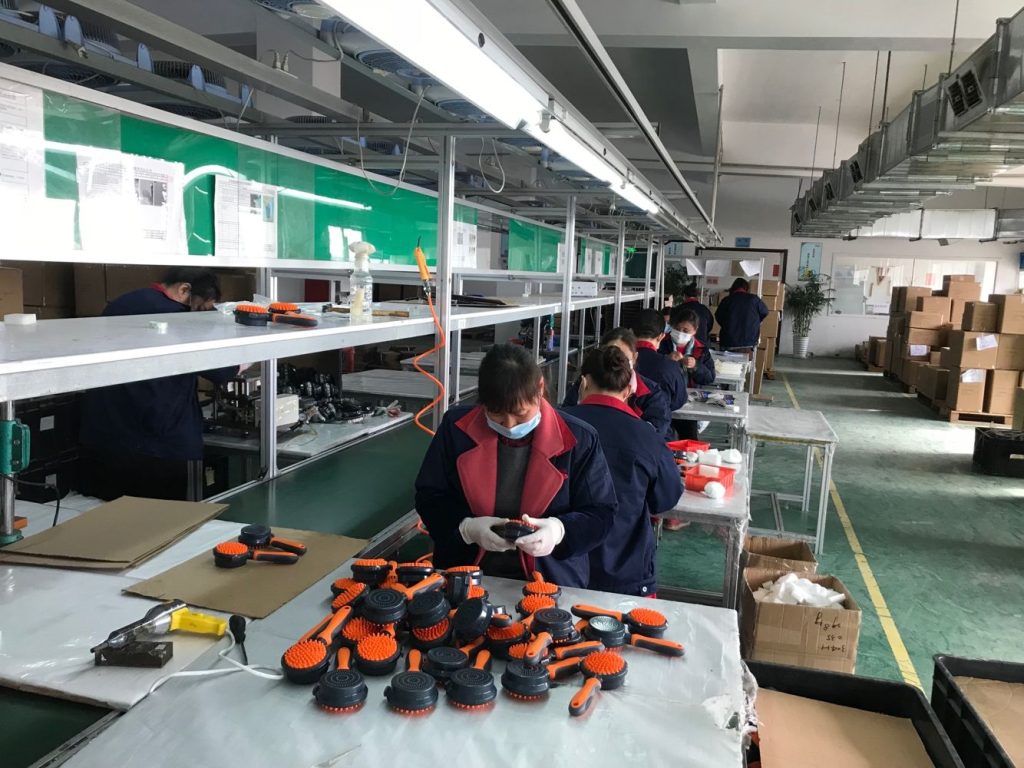 Workers are check the rubber brush.